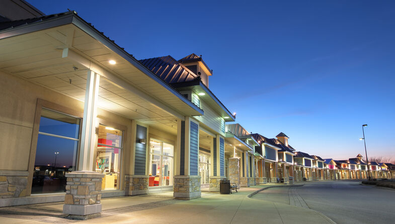 Modern store exterior at sunset