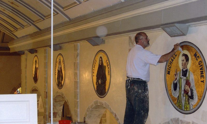 Artist working on a mosaic of Father McGivney at the St. Mary of the Cataract Chuch, Niagara Falls, NY.