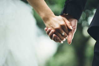 Man women holding hands