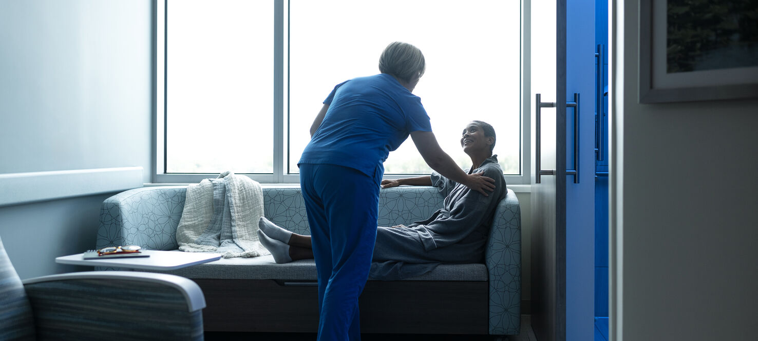 Moffitt nurse comforting patient