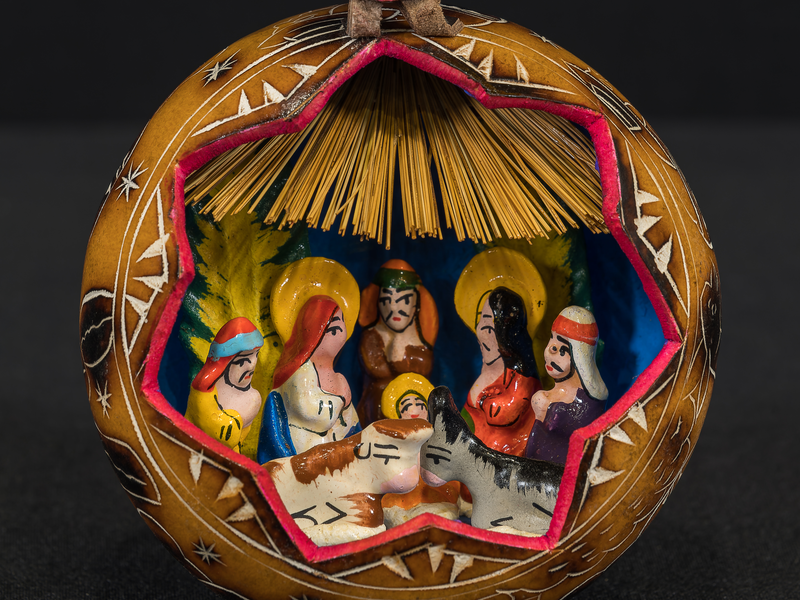 Crèche from Peru. Hollowed out gourd contains the Nativity scene.