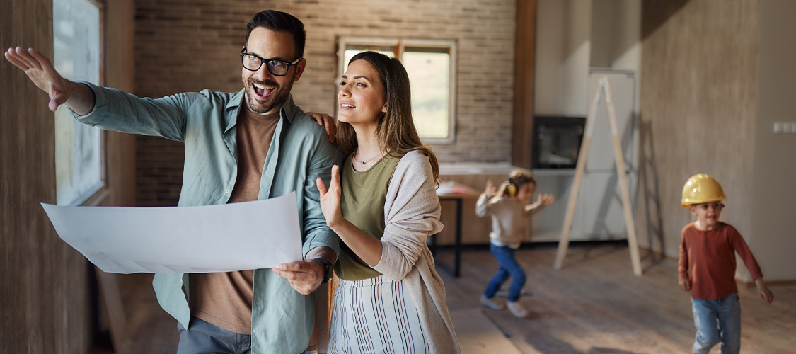 A family inside of their under-construction home