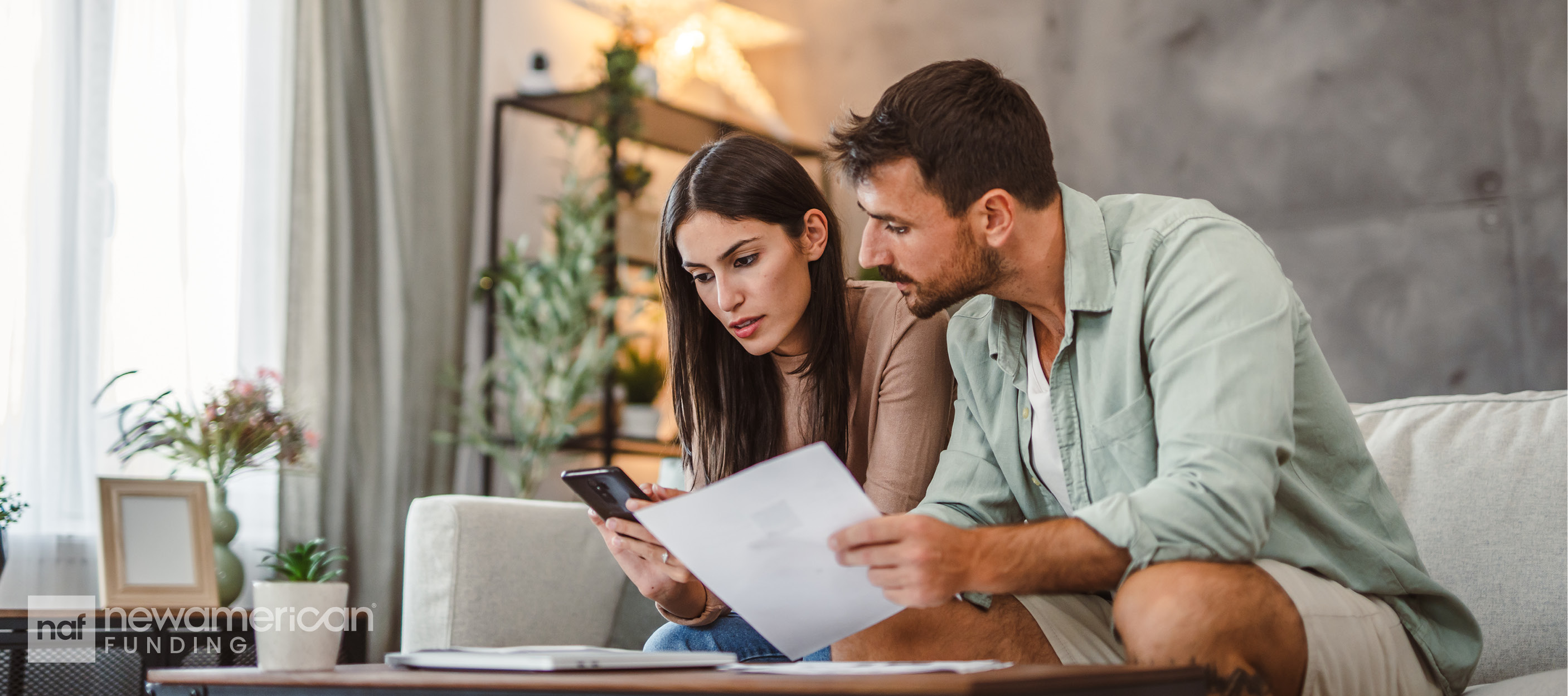 Homebuyers getting paperwork together to buy a home