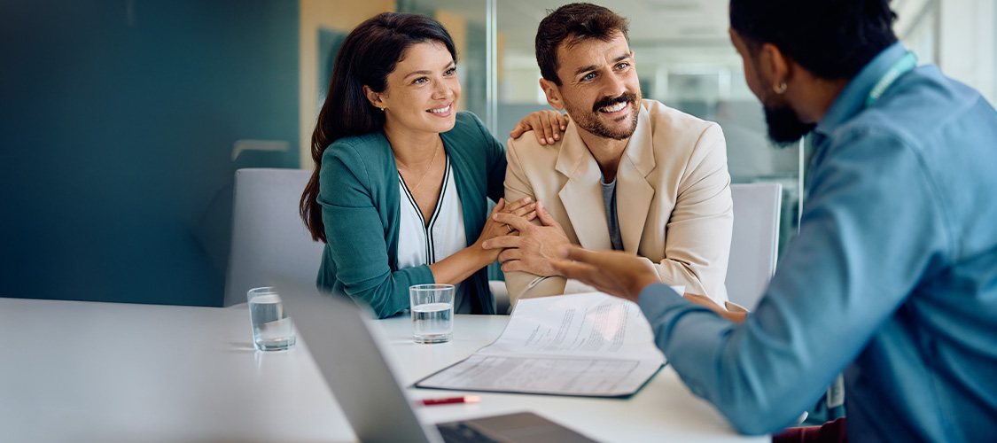 Buyers and seller at the closing table
