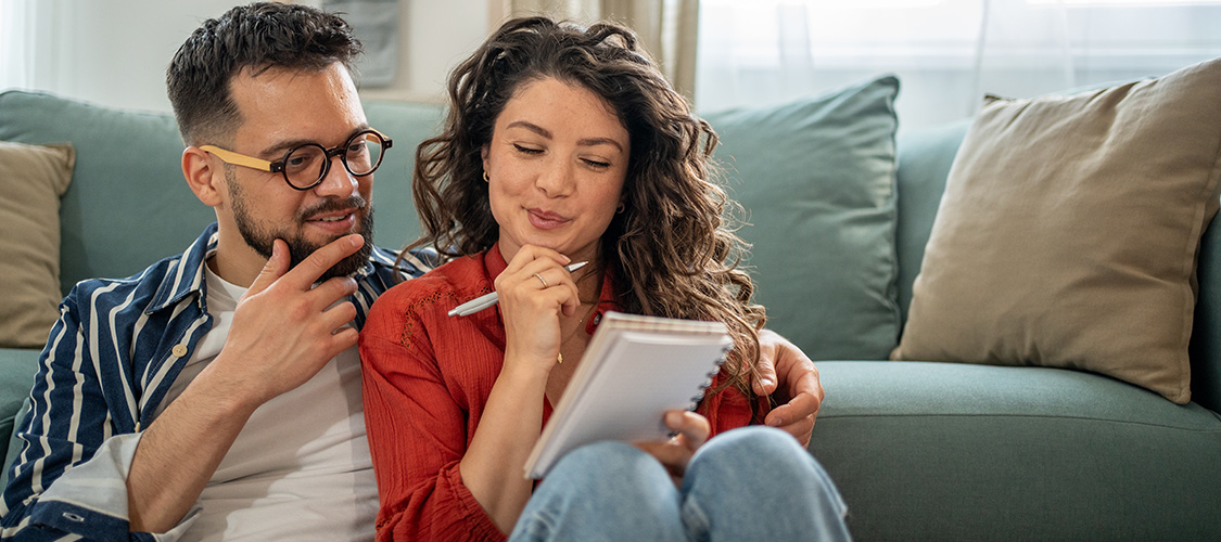 A couple making a financial decision