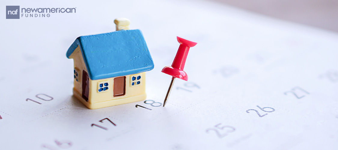 A home on a calendar with a pin on a date.