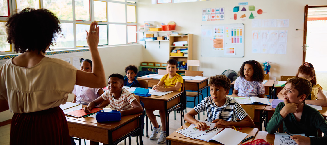 Students and a teacher in a classroom