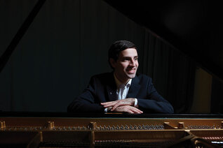 Anthony Coniglio is pictured in the Music Centre at Churchill College