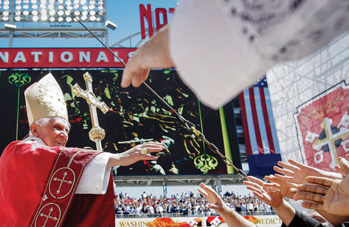 Pope Benedict responds to the enthusiastic crowd after celebrating Mass at Nationals Park in Washington, D.C., on April 17, 2008.