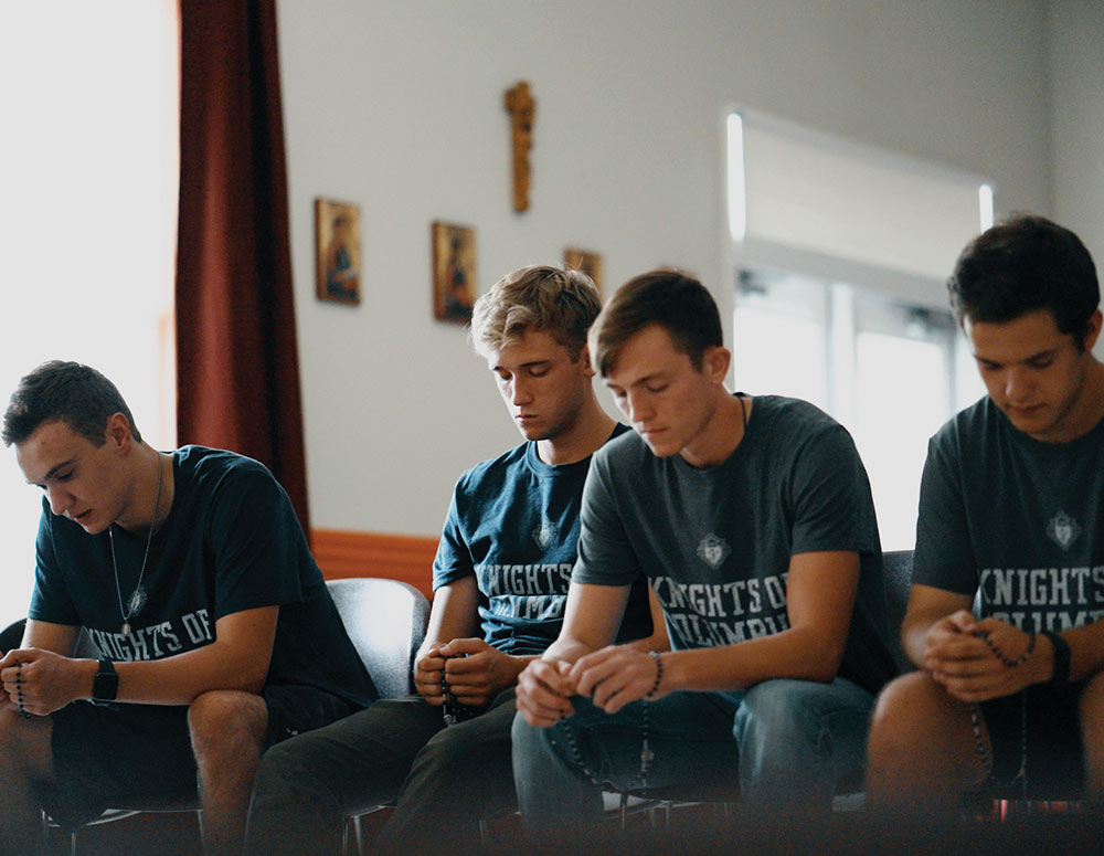Members of St. John Henry Newman Council 11323 at Virginia Polytechnic Institute and State University in Blacksburg, Va., pray the rosary together at the Newman House chapel.