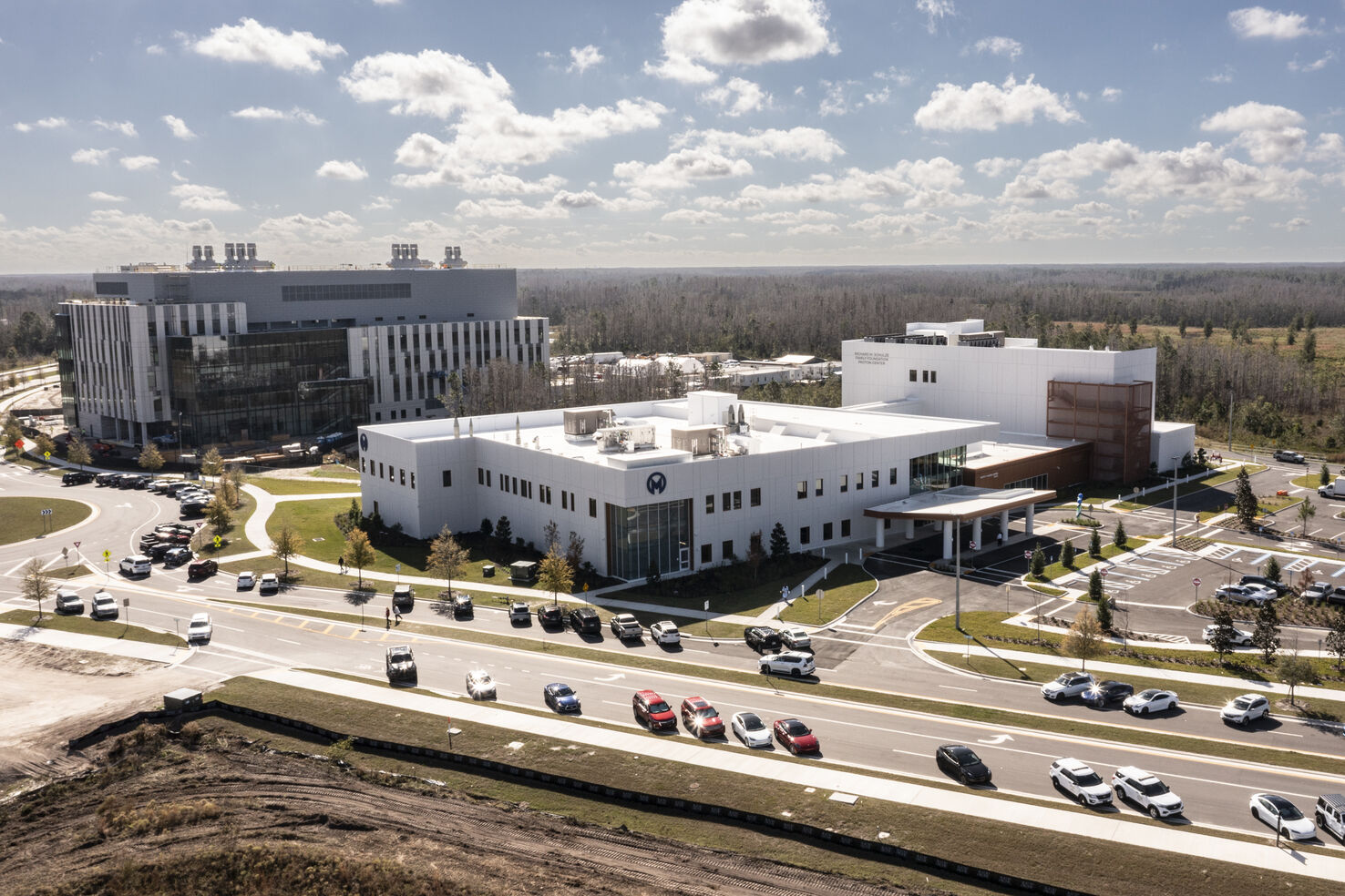 Leaders gather to celebrate the grand opening of the Moffitt Speros Outpatient Center.