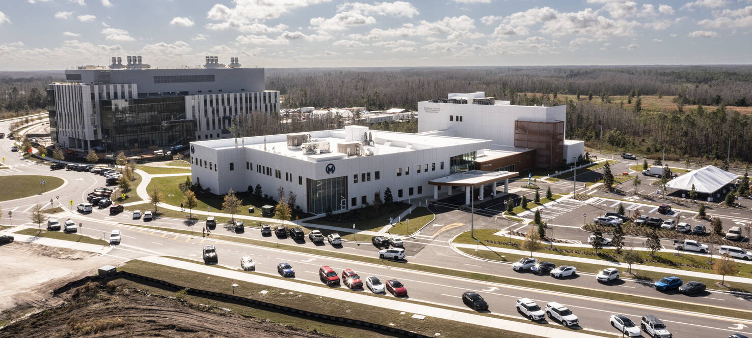 Leaders gather to celebrate the grand opening of the Moffitt Speros Outpatient Center.