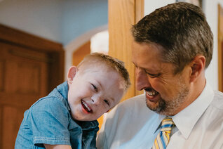 Daniel Schachle laughs with his son Mikey