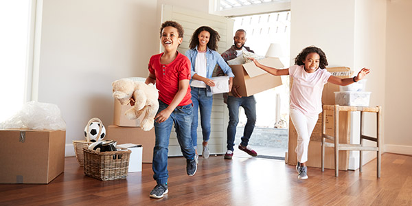 happy family excited moving into their new house