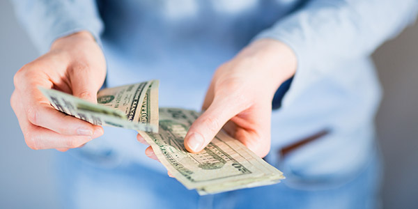 woman counting money