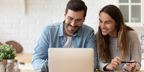 couple looking at a laptop