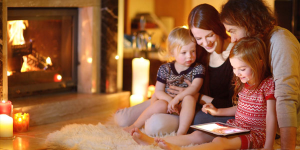 family sitting close to chimney fire