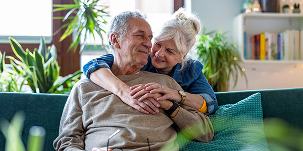 older couple hugging