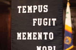 A banner that reads Time flies. Remember death