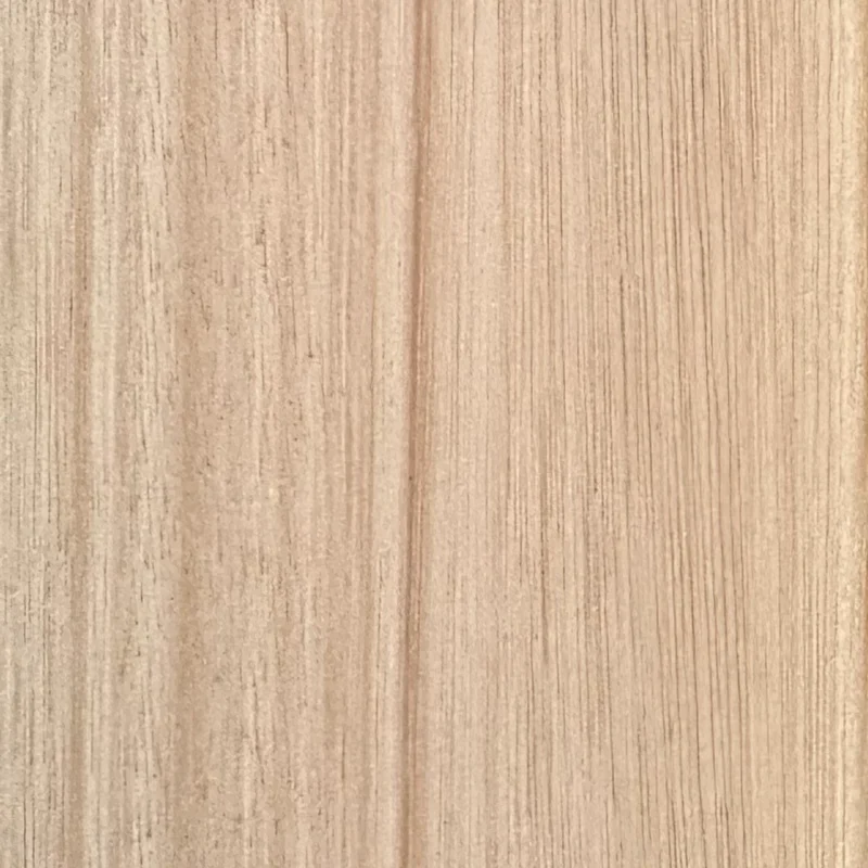 Kiln dried Yukari hardwood board surfaced on four sides, photographed against a neutral background to show grain and colour